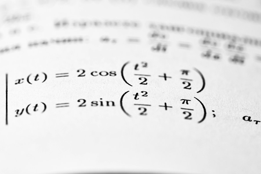 Trigonometric equations with sine and cosine printed on a page